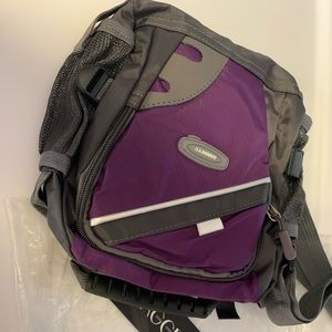 Purple crossbody travel bag